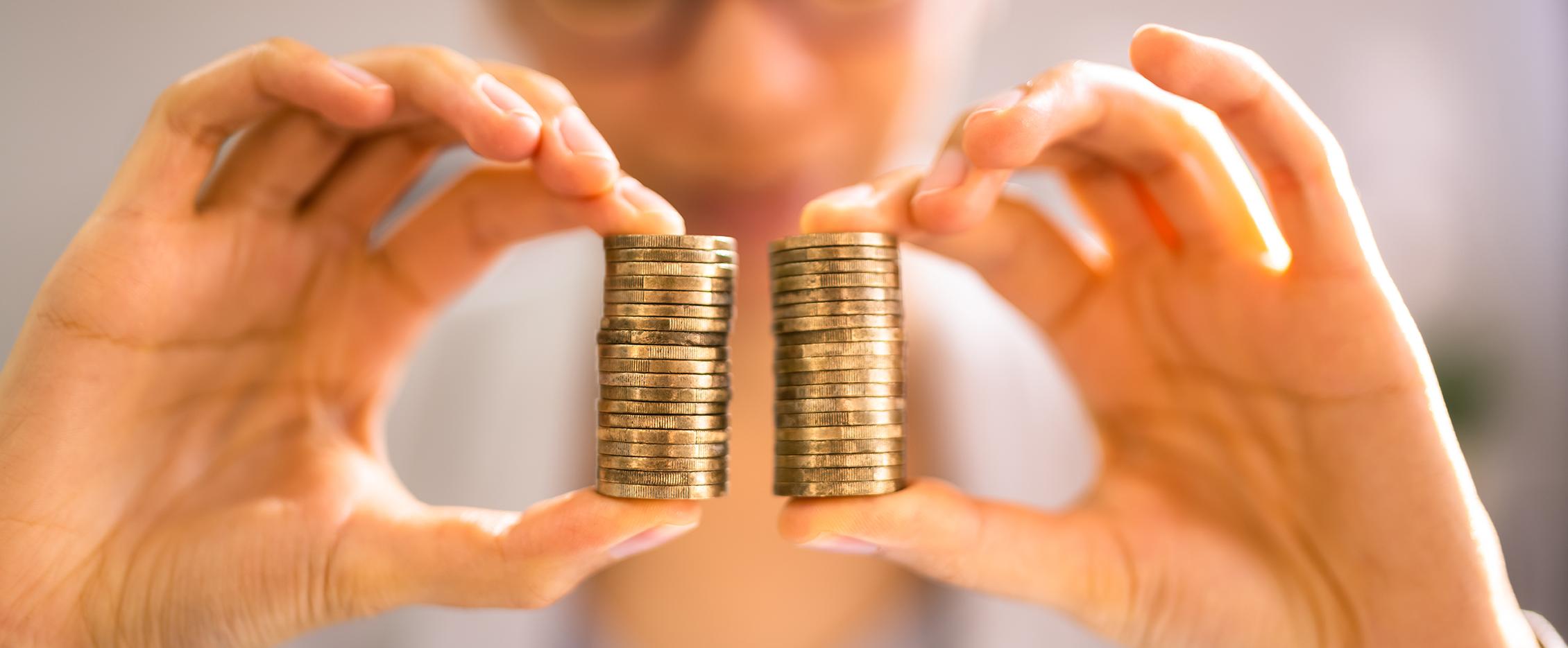 Image of a person holding coins